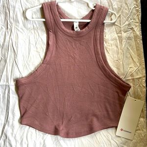 Lululemon Cropped Tank. Wears tight fitted. Brand new. Mauve color. Size 4 - 12